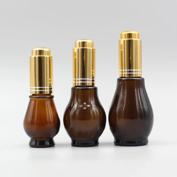 Flydende dråbeflasken,10 ml Amber Enkelt Græskar Form Beholder med Guld Dropper